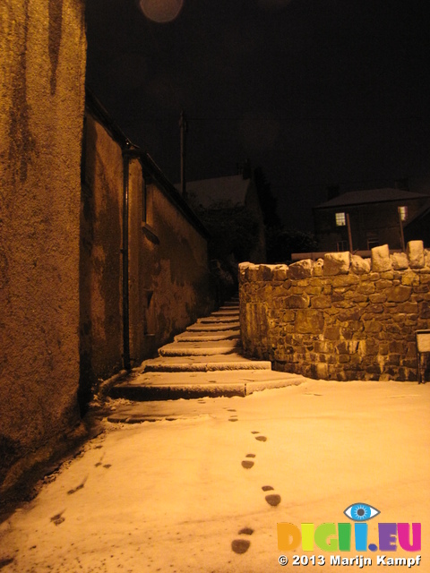 SX25889 Foot prints on snow covered steps